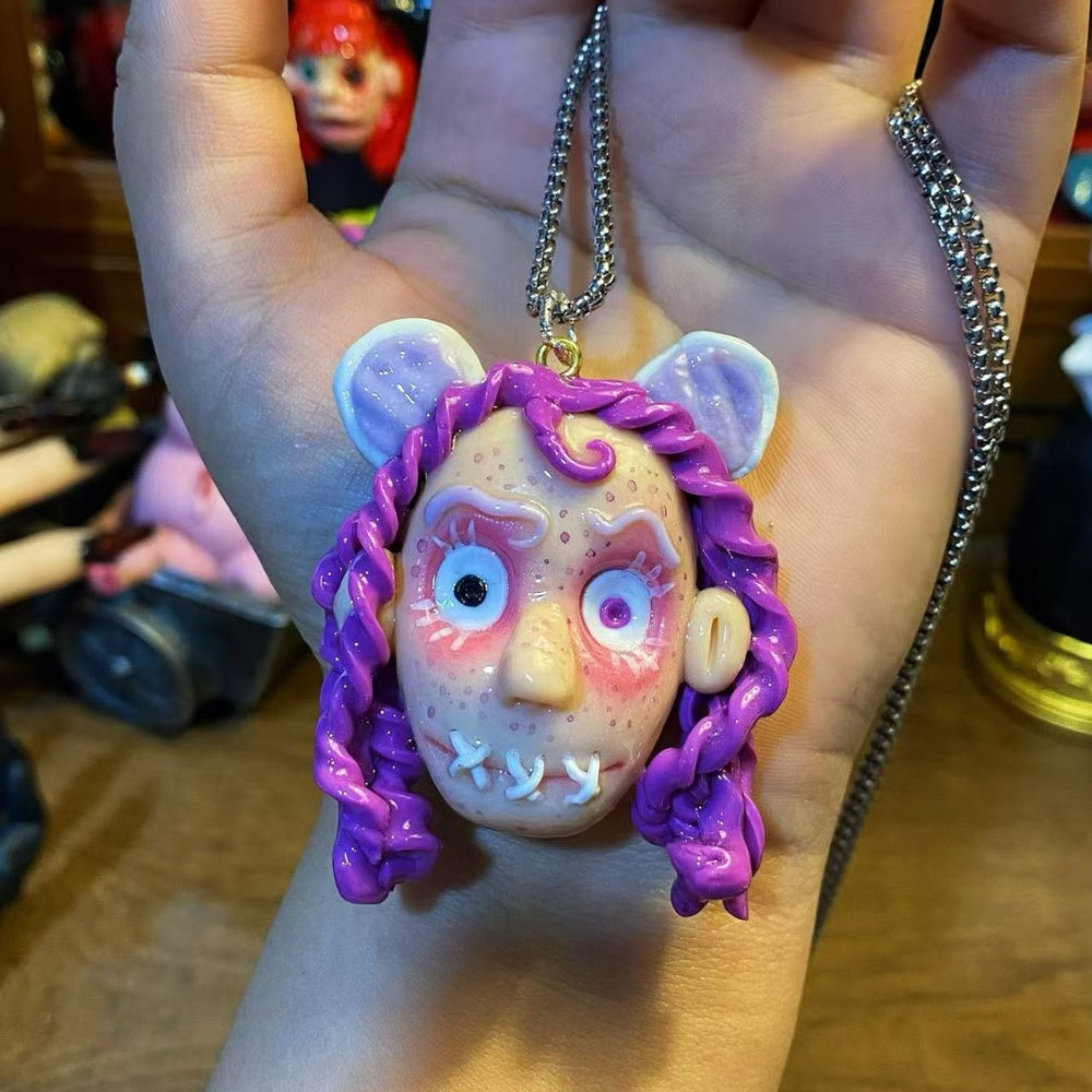 Purple Stitch Doll Necklace