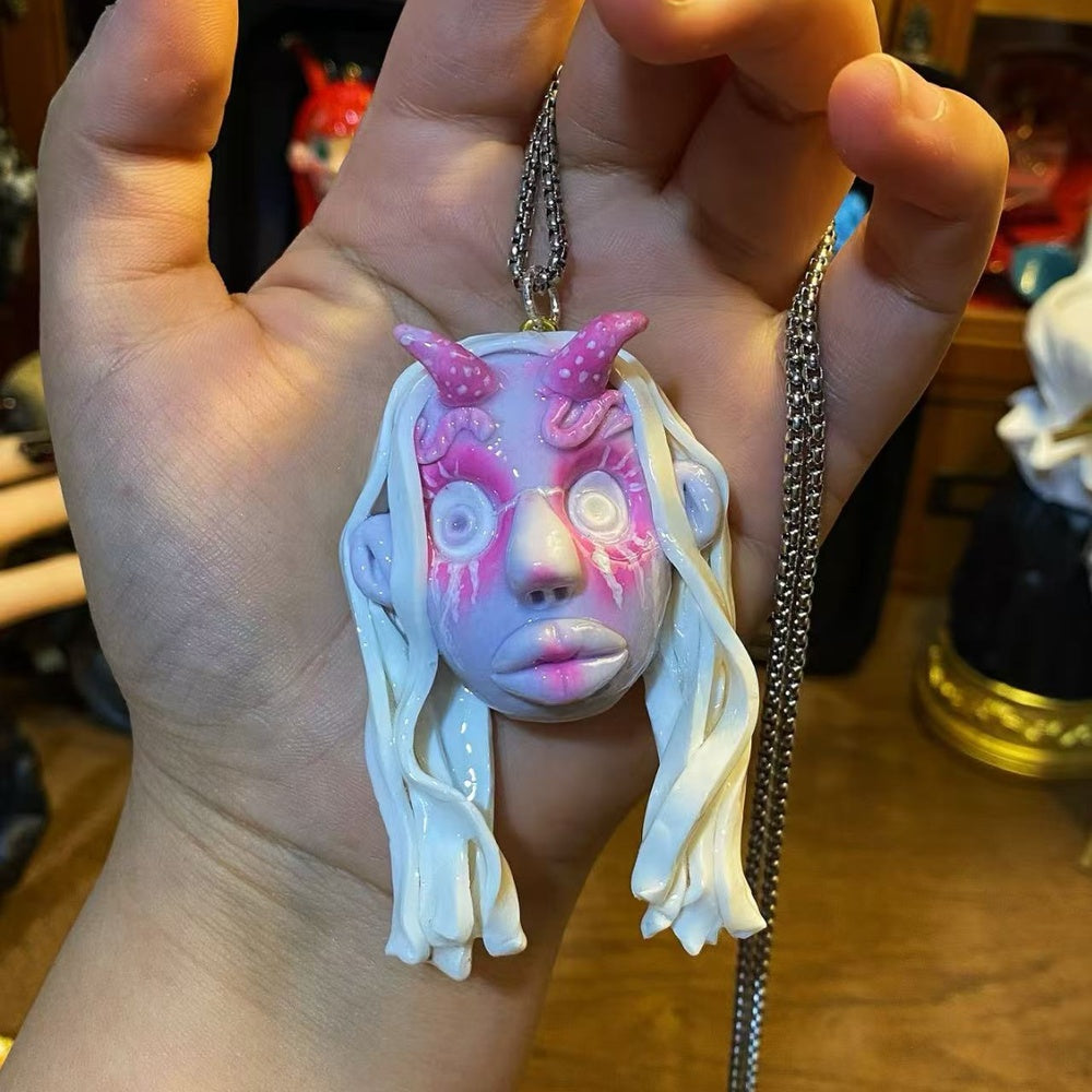 Pink Horn Doll Necklace