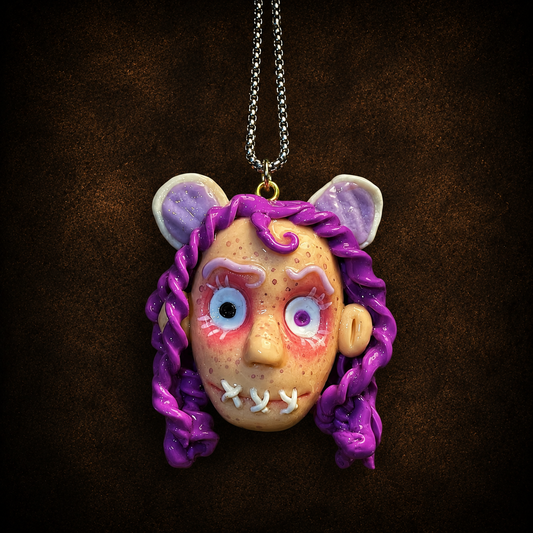 Purple Stitch Doll Necklace