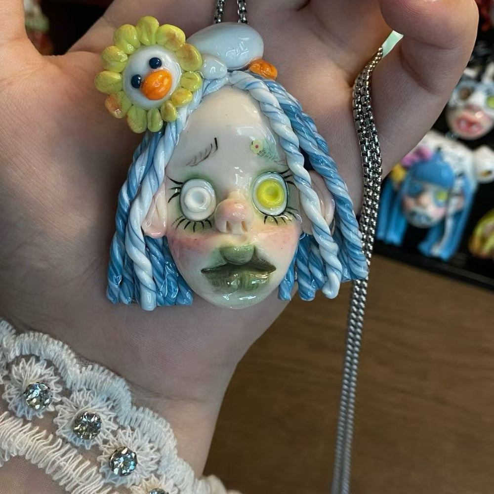 Blue Haired Flower Duck Doll Charm