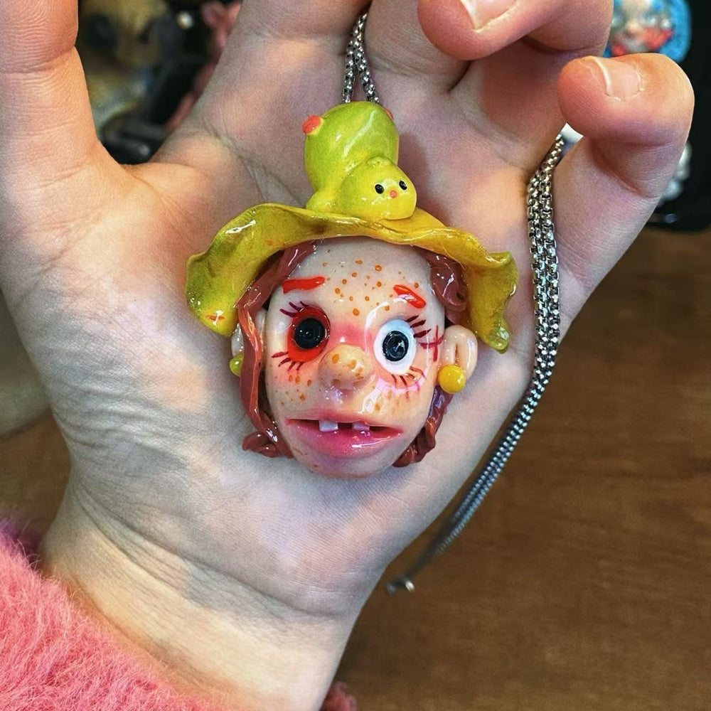 Yellow Hat Creepy Doll Necklace