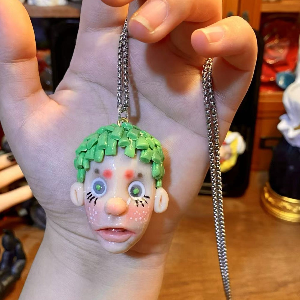 Green Sprout Doll Face Pendant Necklace